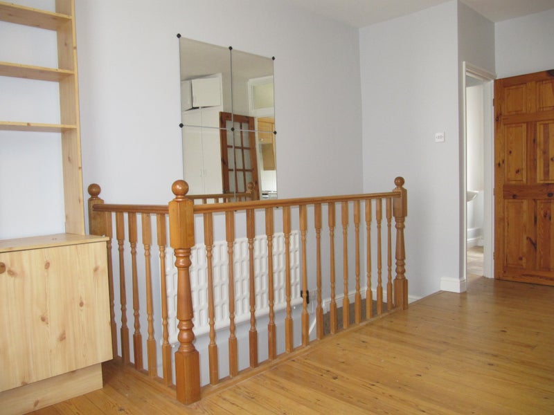 Photo 1: railing down steps 