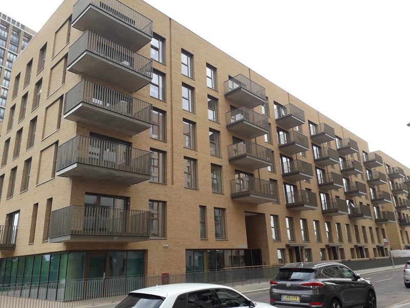 Photo 1: The building where the flat is located.