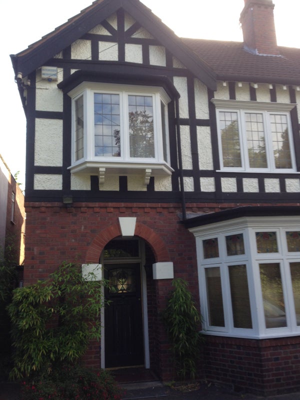 Photo 1: Front of house