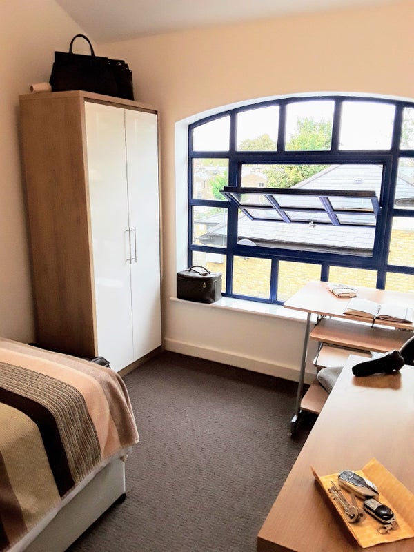 Photo 1: Double bed and matching furniture plus a desk with a view.