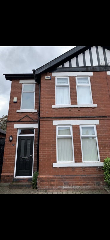 Photo 1: Front Of Property