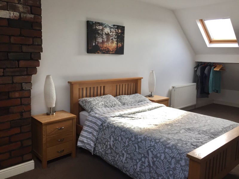 Photo 1: Attic bedroom