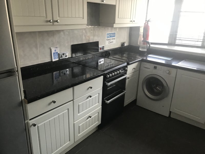 Photo 1: Kitchen