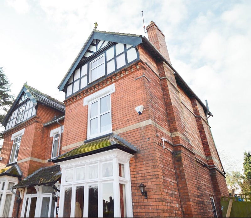 Photo 1: Outside of House