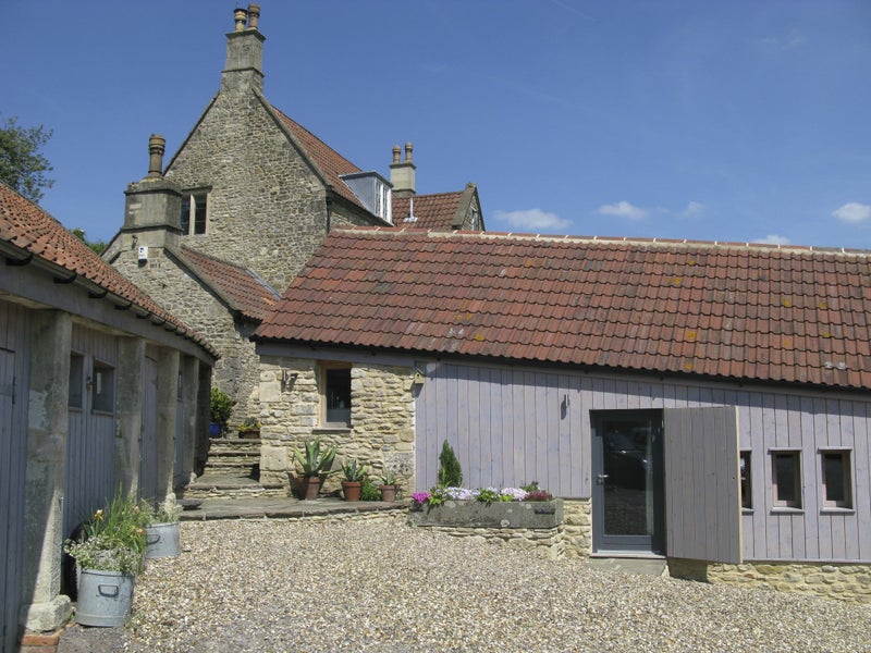 Photo 1: The property (your room has the glass door)