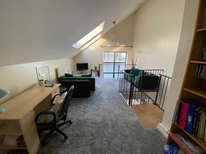 Photo 1: Living Room upstairs overlooking dock