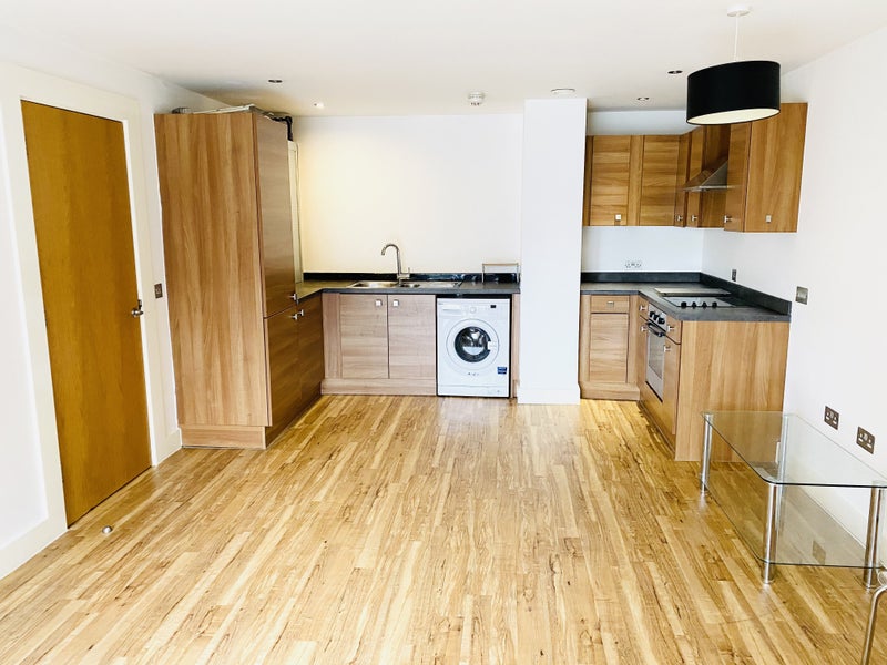 Photo 1: Fuy fitted kitchen with washer/dryer, fridge freezer & microwave
