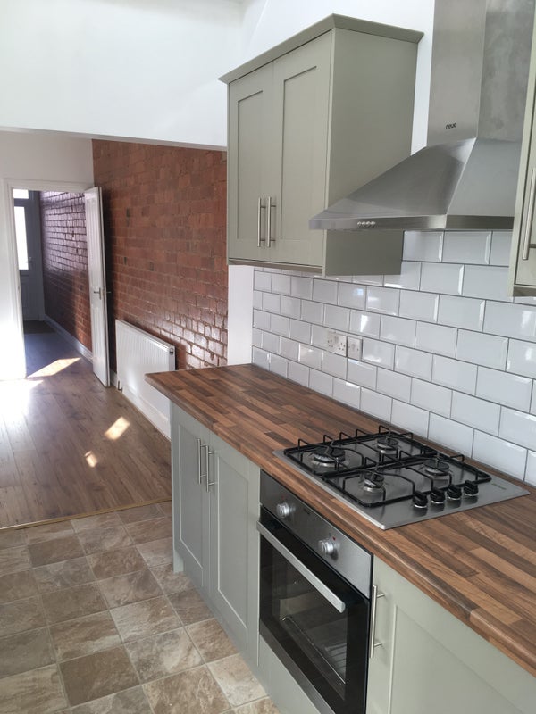 Photo 1: Kitchen