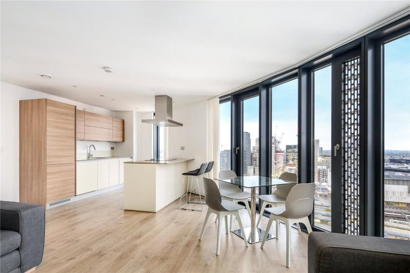 Photo 1: Living Area + Kitchen