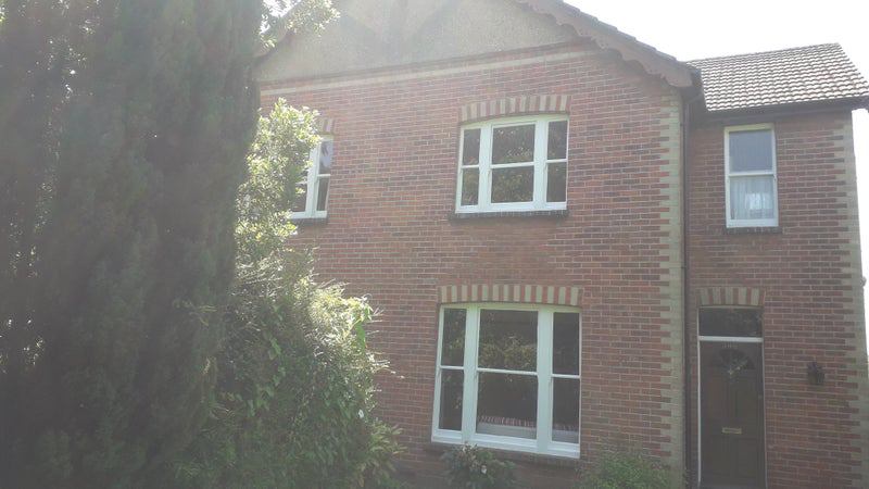 Photo 1: Front of house