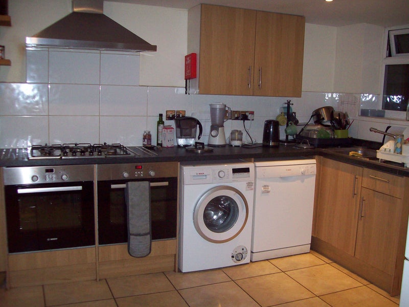 Photo 1: Kitchen