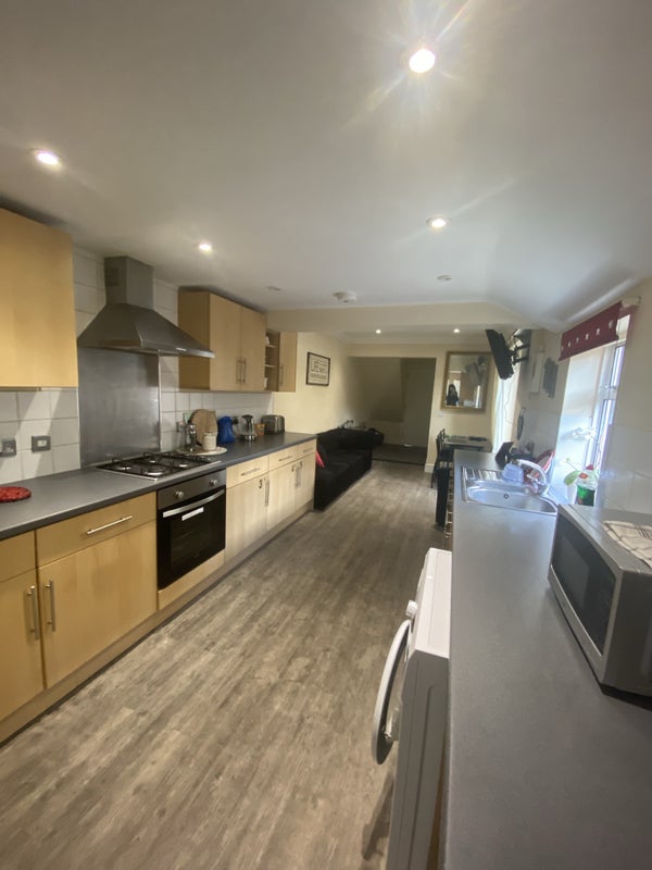 Photo 1: kitchen area of communal zone