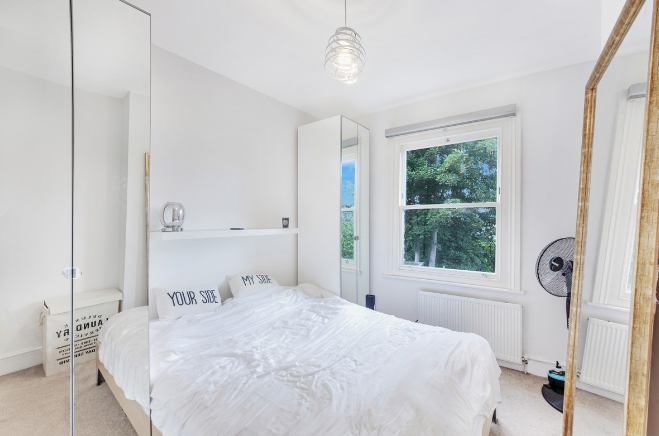 Photo 1: back bedroom