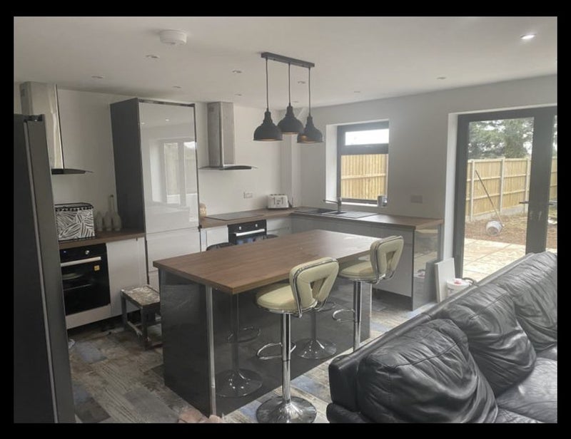 Photo 1: Shared communal living, kitchen area