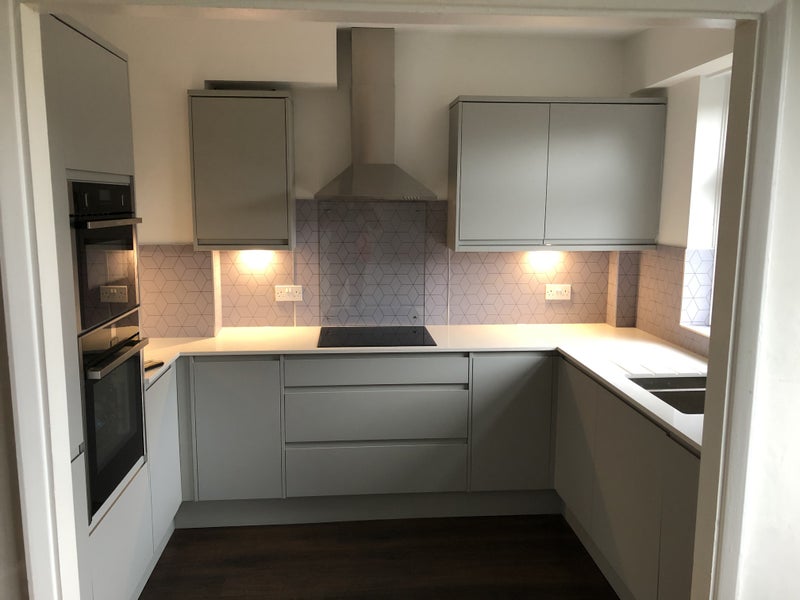Photo 1: Kitchen with integrated double oven, fridge freezer, dishwasher & washer dryer