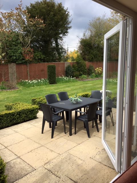 Photo 1: terrace & garden view through lounge double doors 