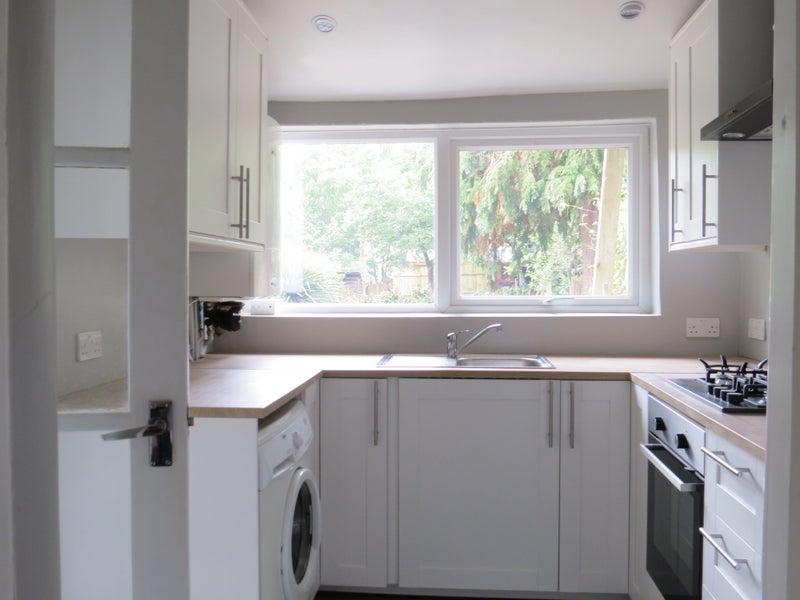 Photo 1: Kitchen