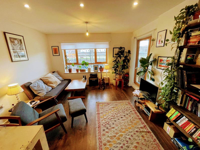 Photo 1: Large open plan lounge - opens onto balcony