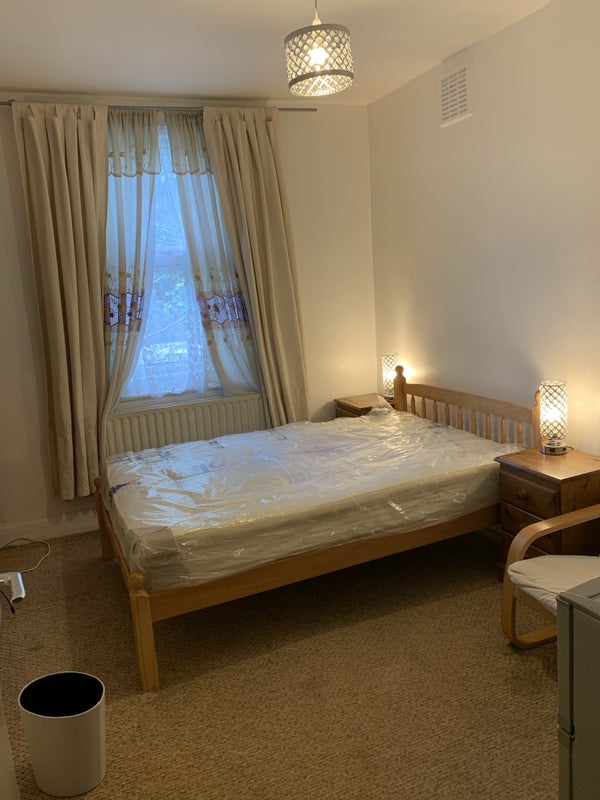 Photo 1: Double Bedroom with toilet attached 