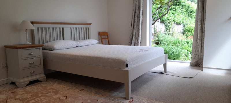 Photo 1: Five foot wide bed