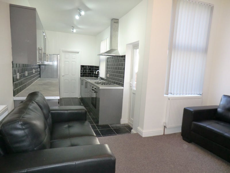 Photo 1: open plan kitchen