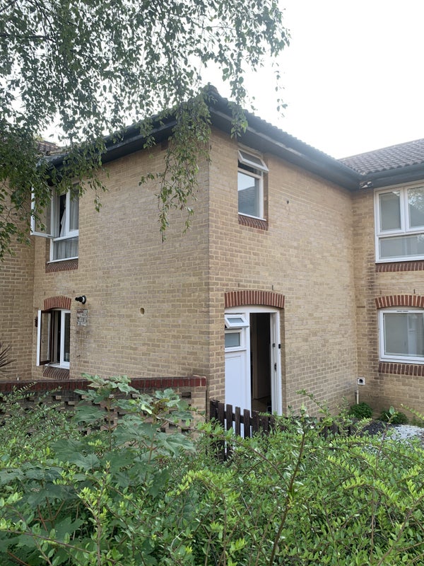 Photo 1: Front entrance in secluded and quiet oassage.