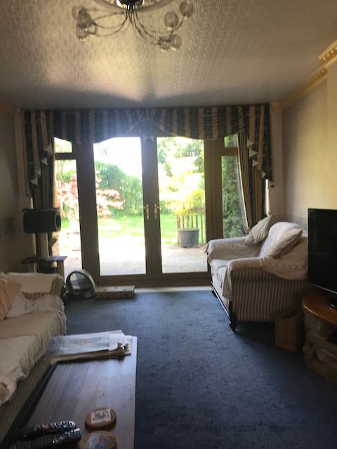 Photo 1: Lounge With Double Doors