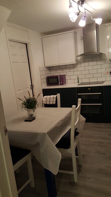 Photo 1: Kitchen with large fridge freezer 