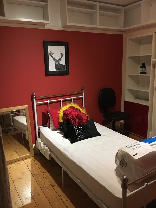 Photo 1: Bed can be moved against wall to create more space
