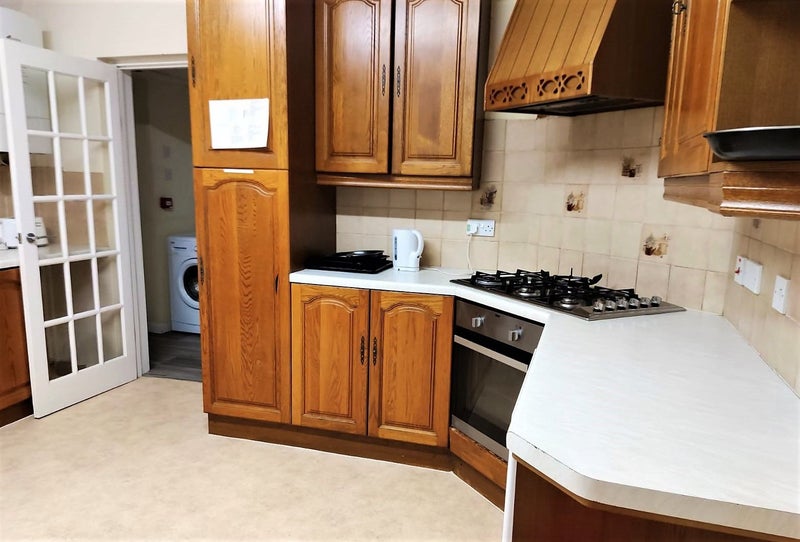 Photo 1: Main kitchen and utility