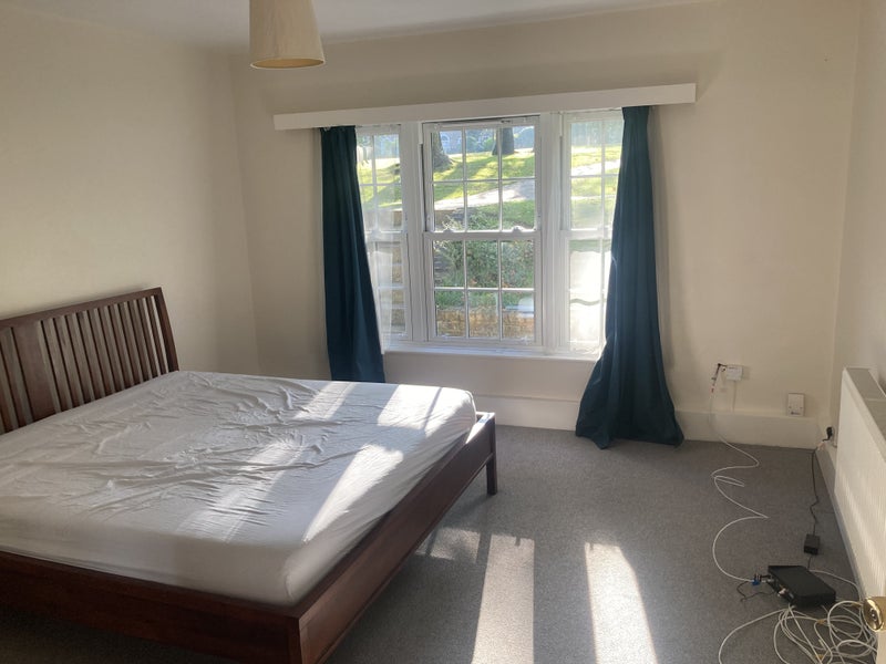 Photo 1: Bedroom with garden view