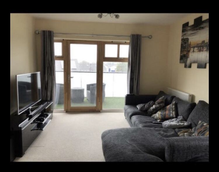 Photo 1: Front room with balcony