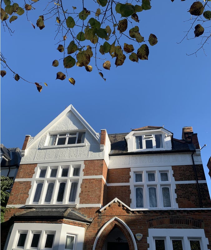 Photo 1: Front of house