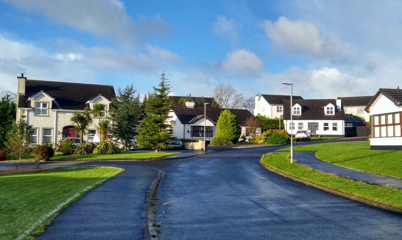 Photo 1: Approach to house.