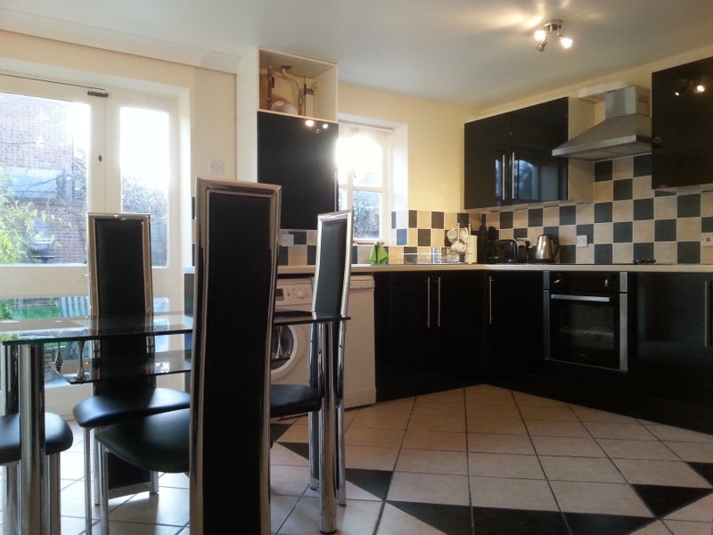 Photo 1: Kitchen