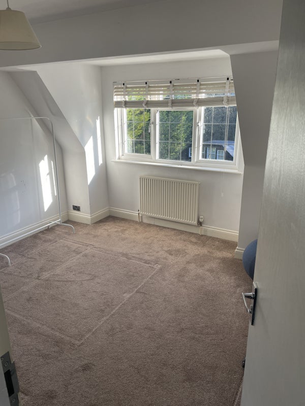 Photo 1: Bright and Airy Room