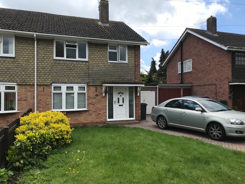 Photo 1: Front of house and drive