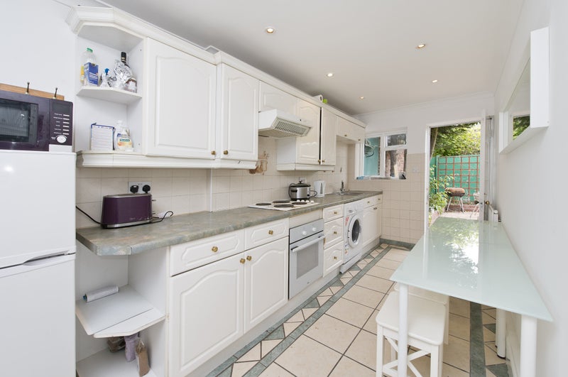 Photo 1: Kitchen
