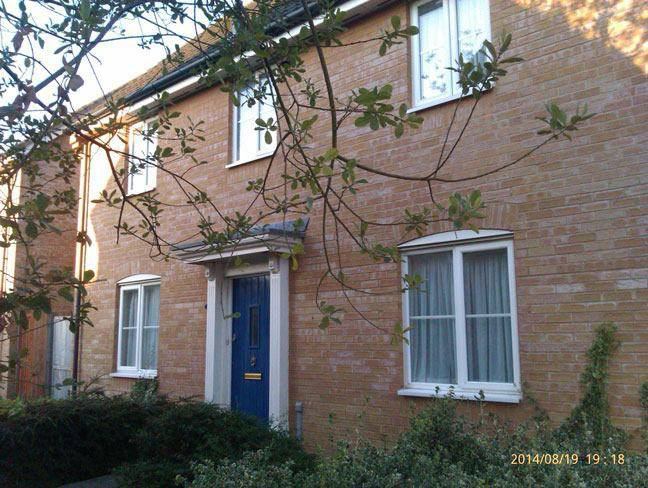 Photo 1: House front entrance