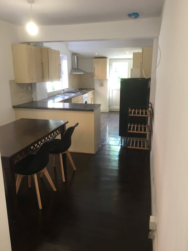 Photo 1: Kitchen/ dinning