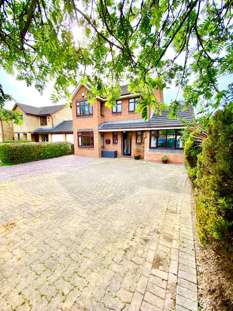 Photo 1: Front Elevation