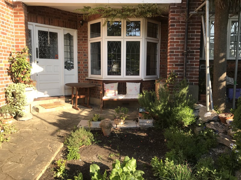 Photo 1: Front view of home