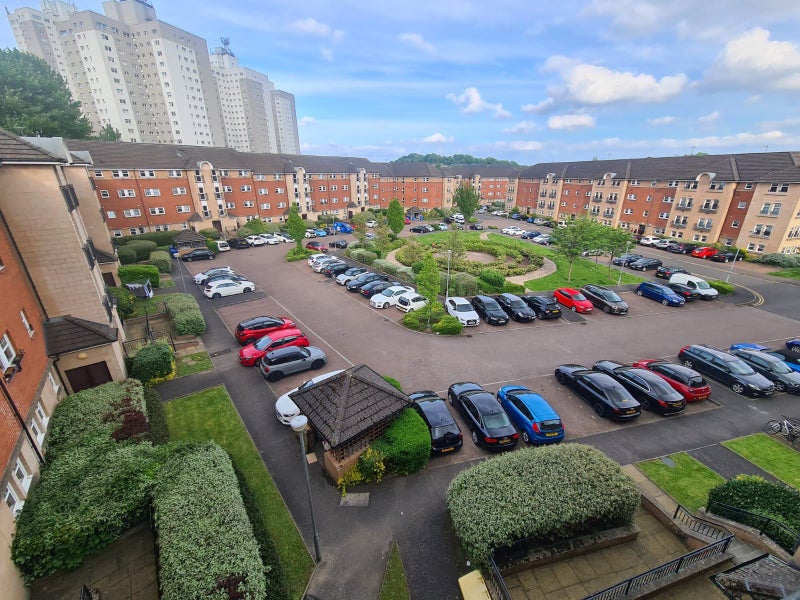 Photo 1: parking and communal garden area