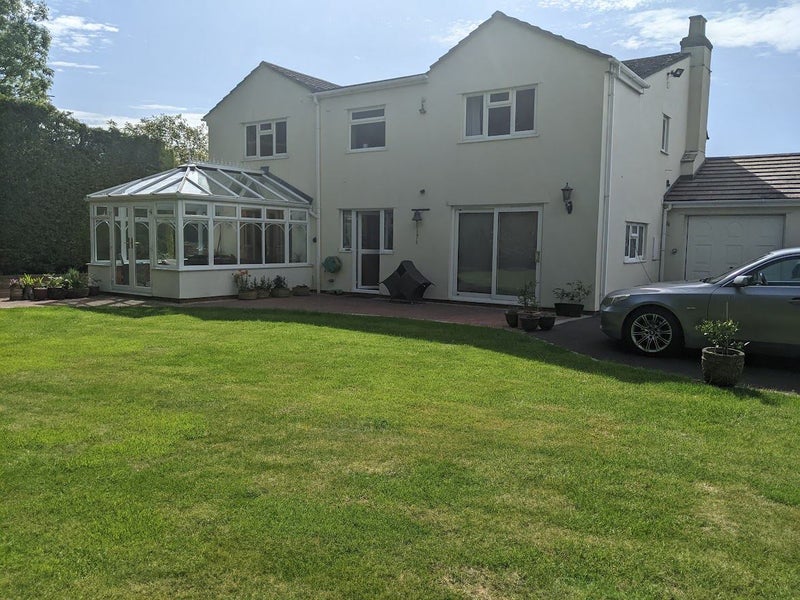 Photo 1: Outside Rear View