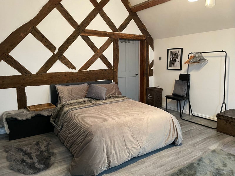 Photo 1: Your bed & clothes rail