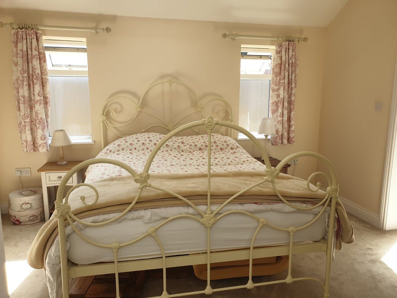 Photo 1: Bedroom with bedding