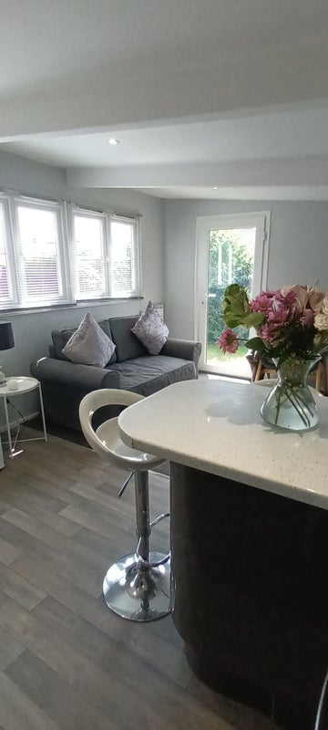 Photo 1: Open plan lounge