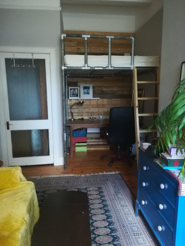 Photo 1: built up bed with desk underneath
