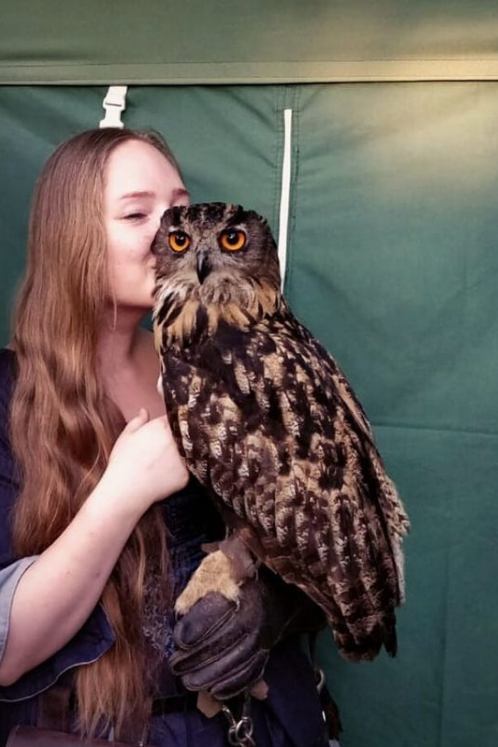 Photo 1: Me and some giant owl a few years ago at a medieval fair