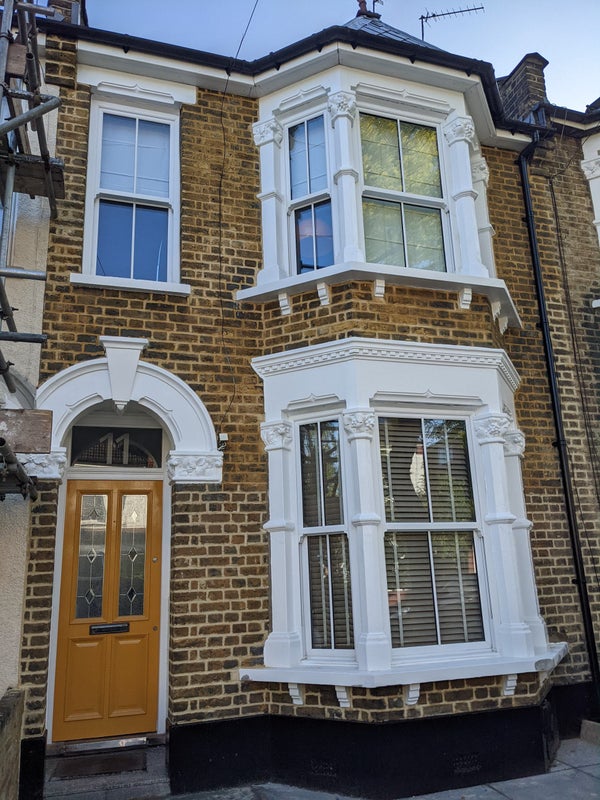 Photo 1: Front of house.